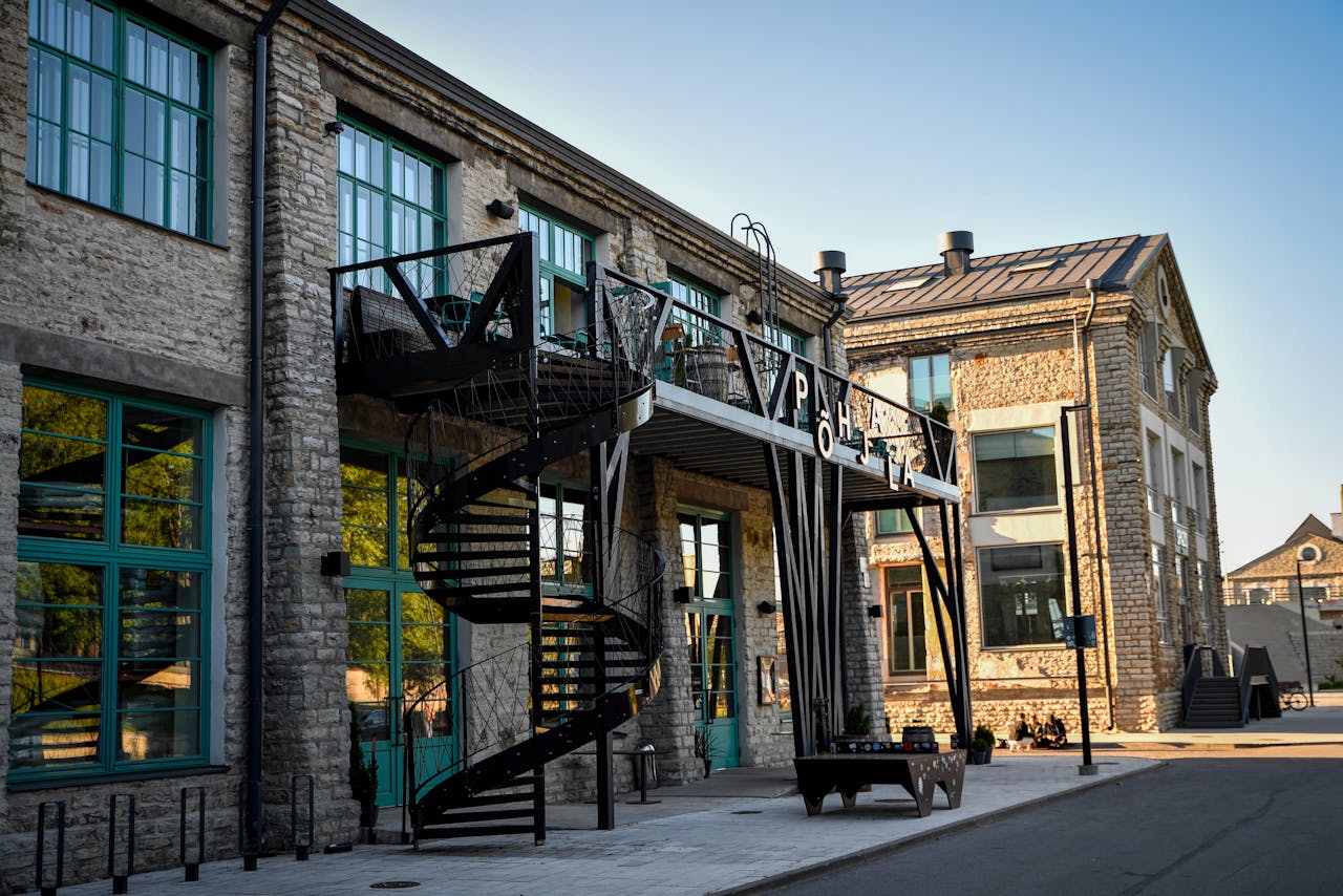 Modern industrial architecture featuring a spiral staircase in Tallinn, Estonia.